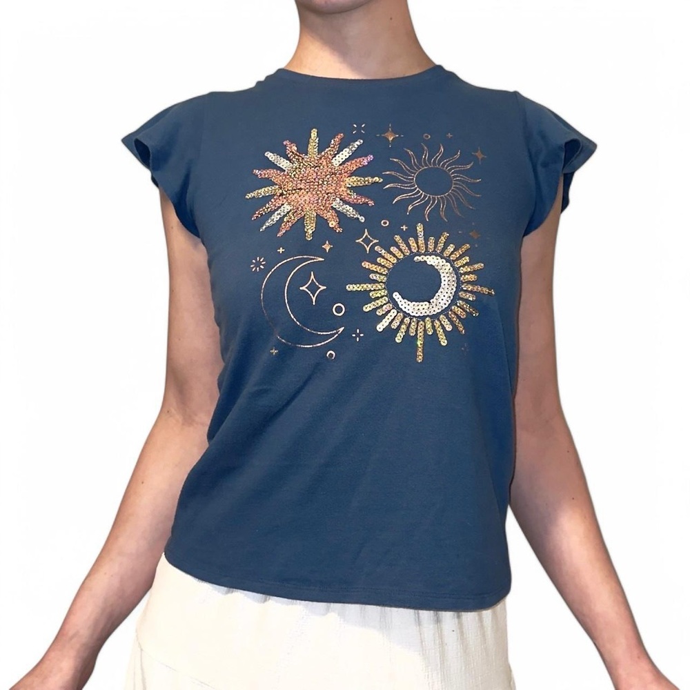 Navy blue short sleeve ruffle sleeve top with sun, moon, and stars design